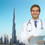 A healthcare professional smiling with the Dubai skyline in the background, representing a medical career in the UAE.
