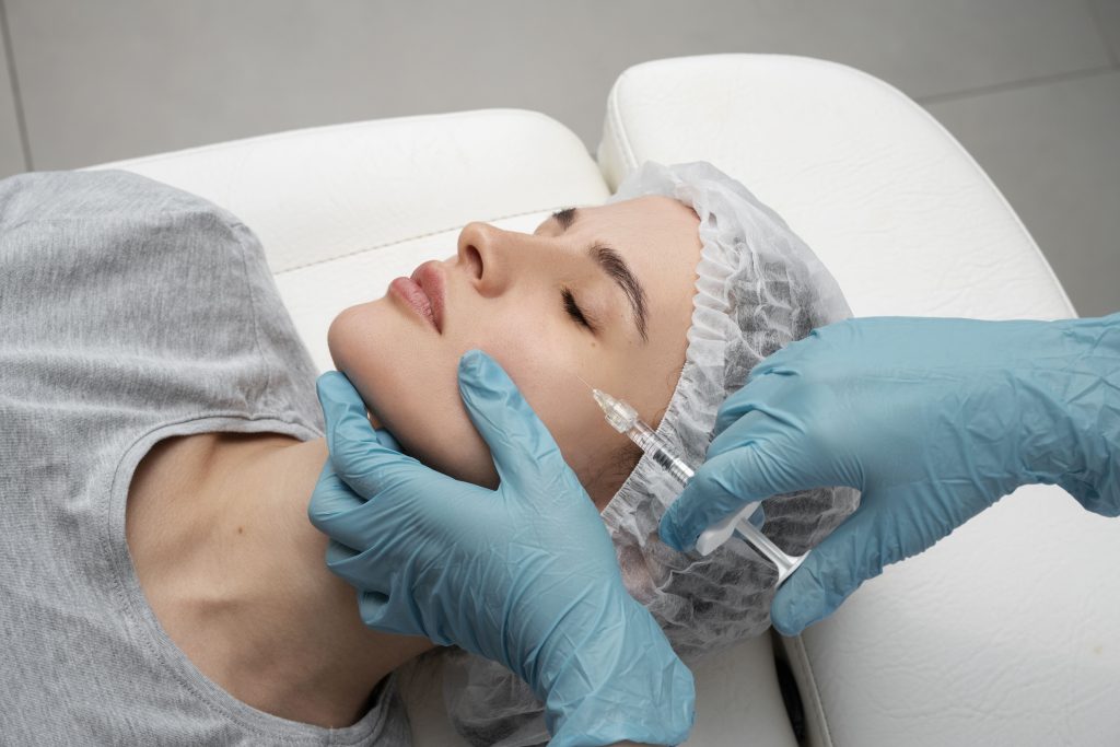 woman getting PLLA injections
